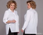Фото белой блузки со смещенными боковыми швами по выкройке