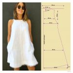 Біла літня сукня по простій формі трапеція